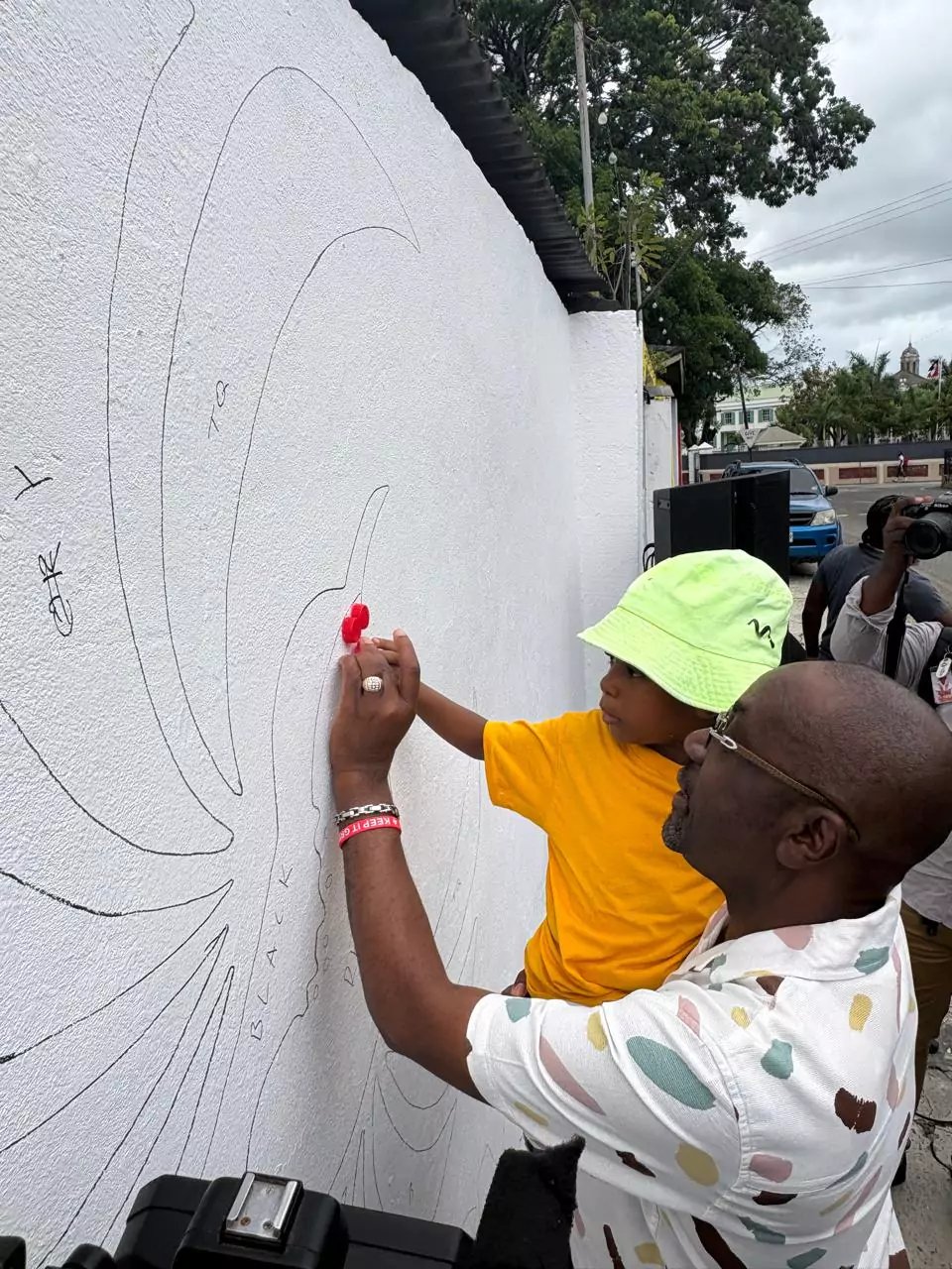 Recycled Bottle Caps Form CHOGM 2026 Mural at Antigua Recreation Grounds